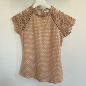 Polka dot top with sheer lace sleeve with scallop detail